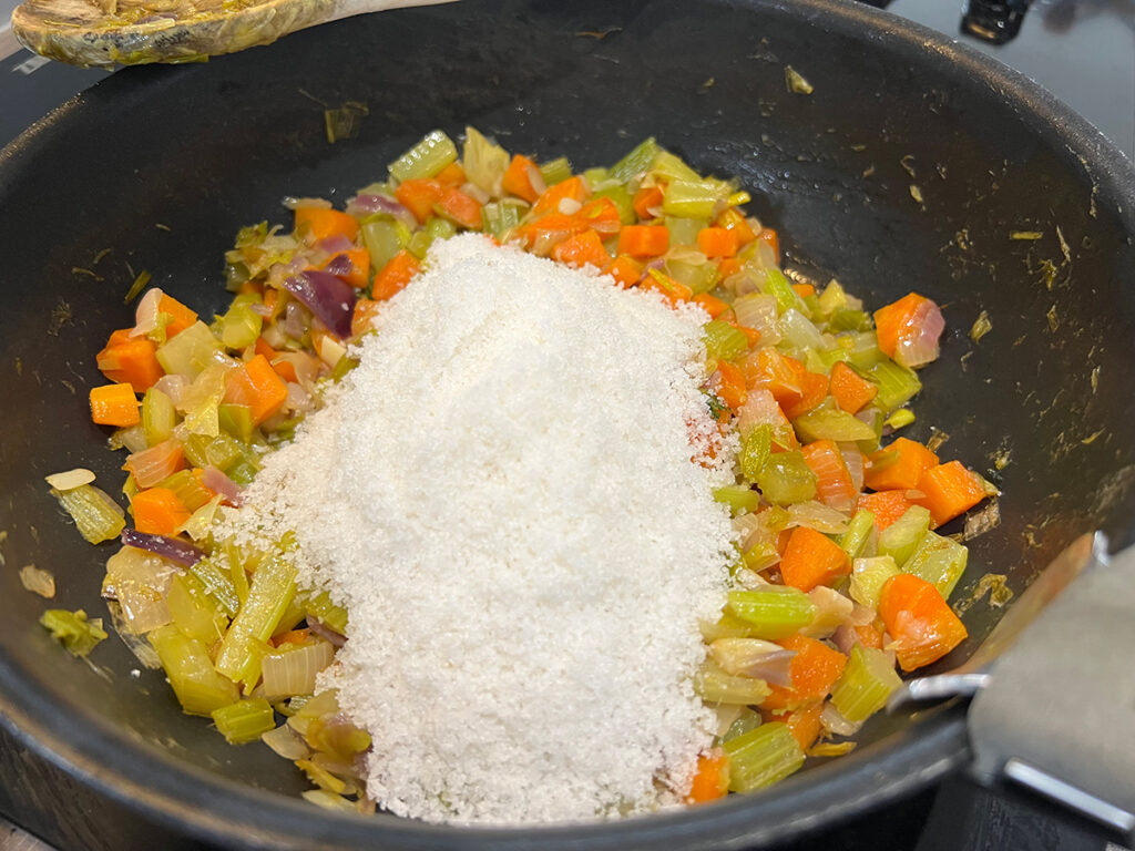 Add the salt to the vegetables.